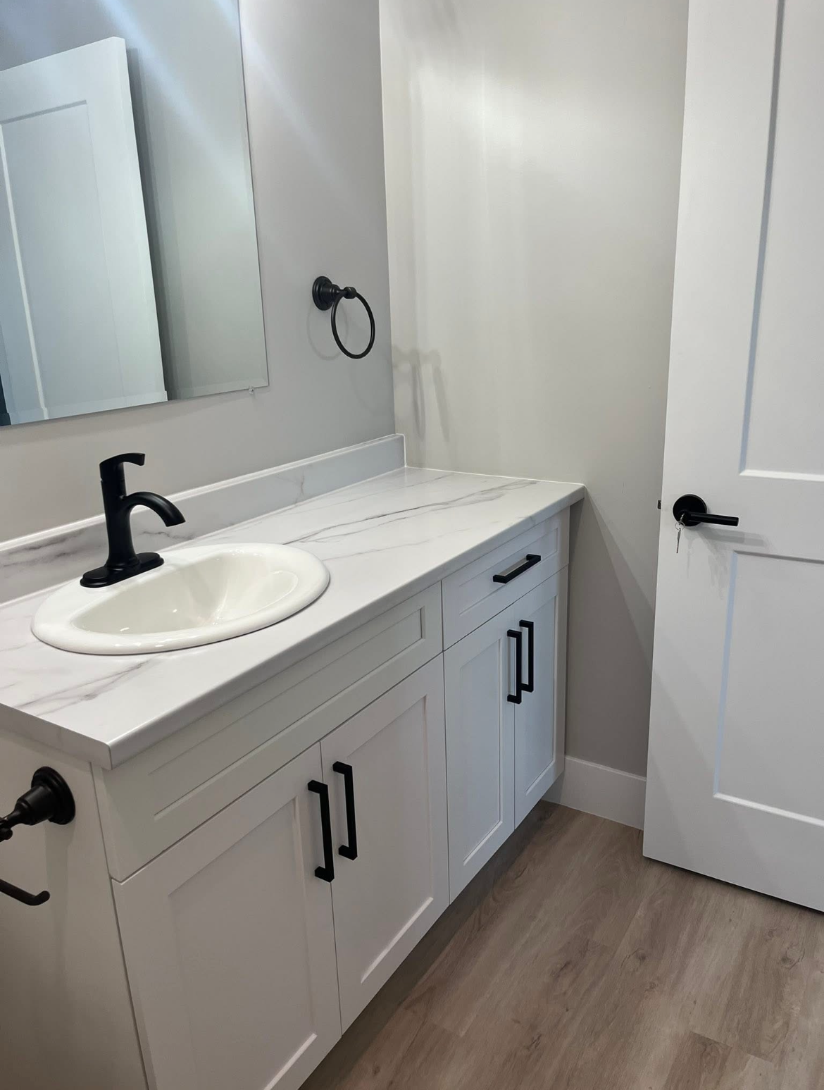 Bathroom vanity in a 204 Bellevue Heights unit