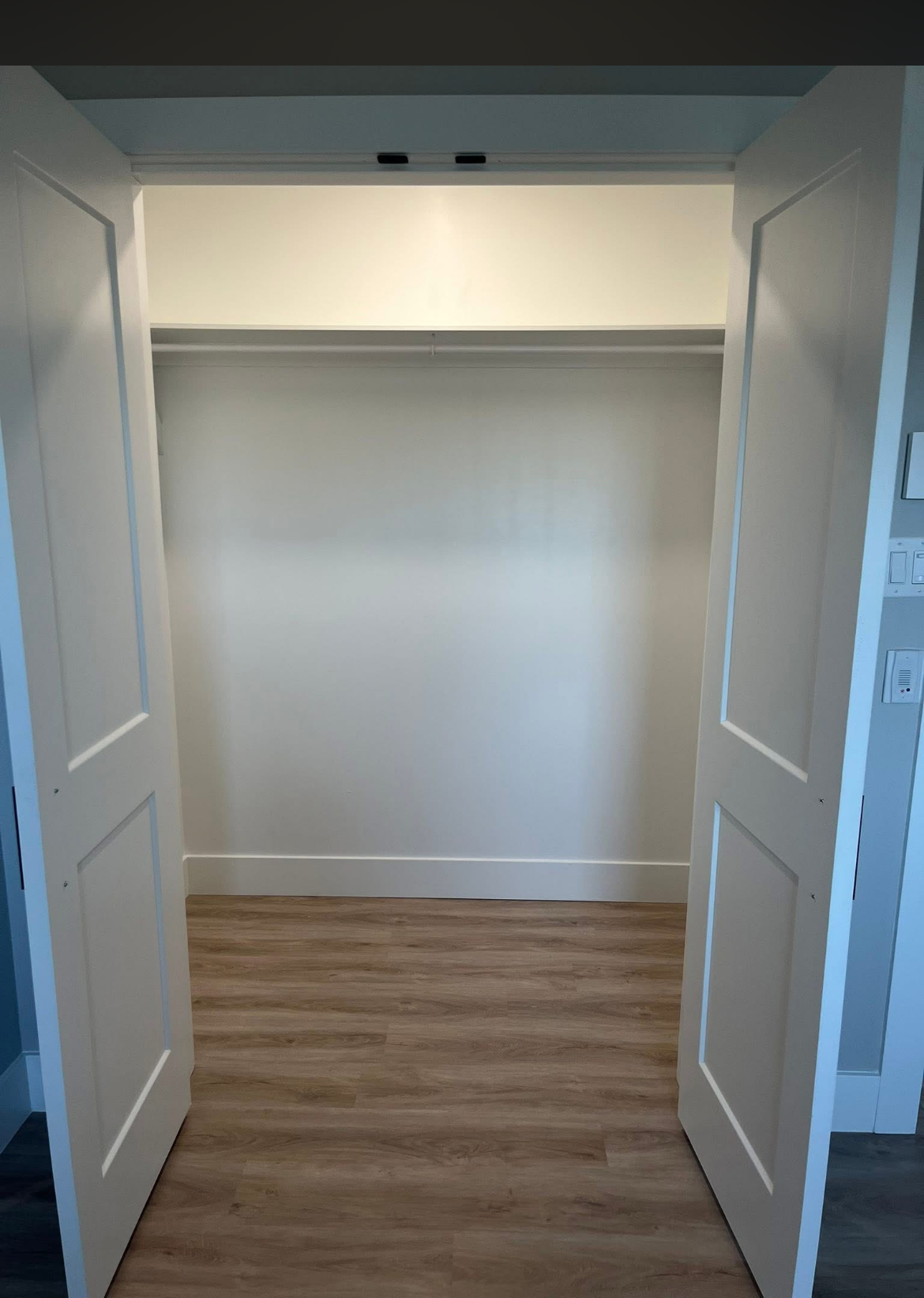 Bedroom closet in a 204 Bellevue Heights unit