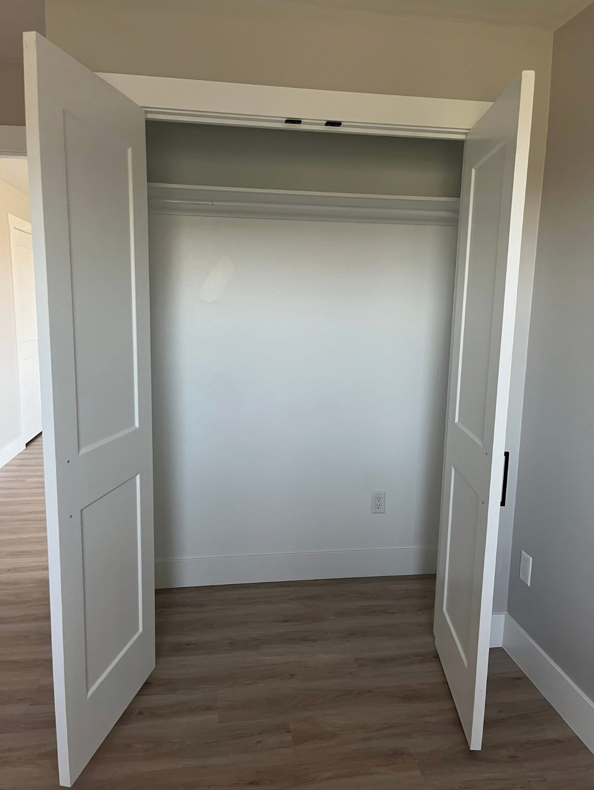 Second bedroom closet in a 204 Bellevue Heights unit